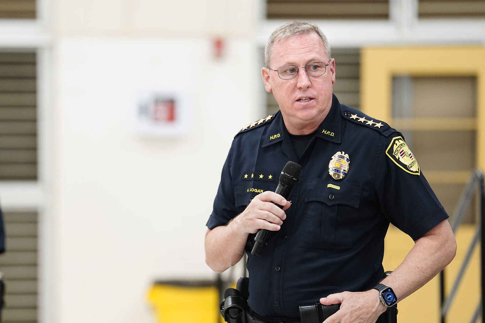 Honolulu Police Department Chief Joe Logan speaks during a West Oahu Town Hall on public safety Monday, Sept. 16, 2024, at Nanakuli High and Intermediate School in Waianae. State Rep. Darius Kila hosted the town hall with community members and law enforcement. (Kevin Fujii/Civil Beat/2024)