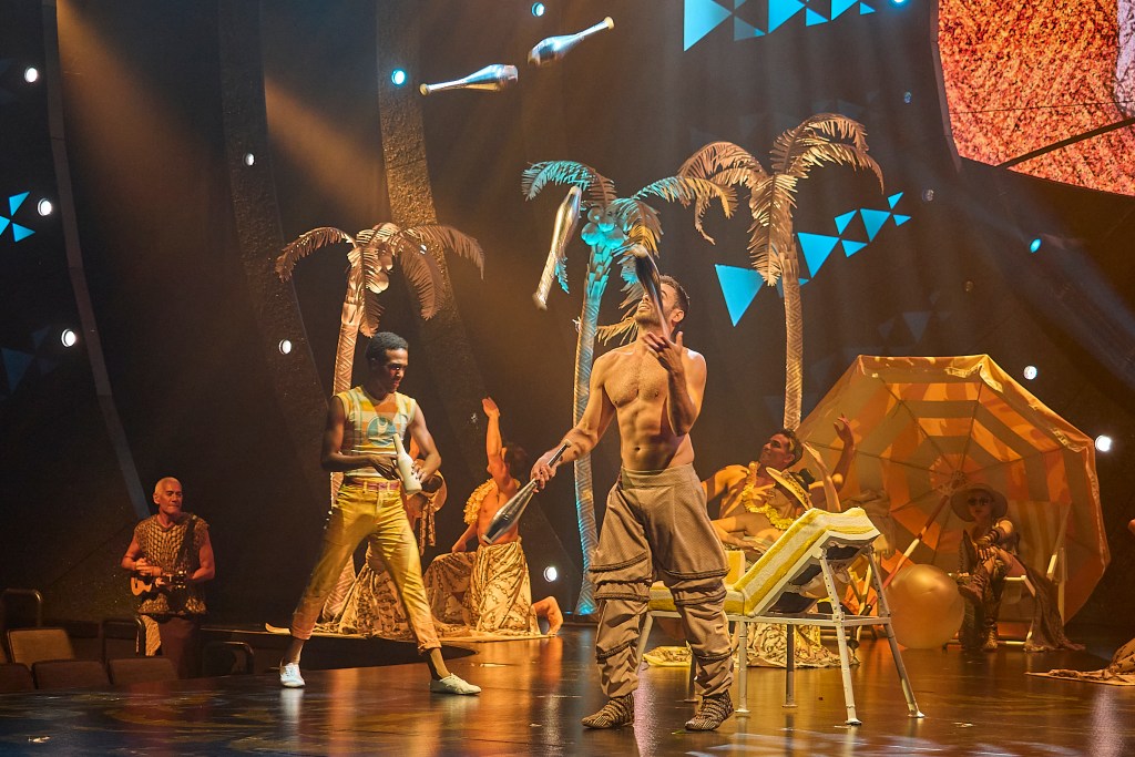 Cirque Du Soleil has arrived in Waikiki Honolulu, with an Hawaii inspired show entitled 'Auwana. The title stems from the loose translation to wander, to veer off the beaten path or to embark on a journey and comes complete with a rendition of Waikiki and juggling and ukulele playing Beach Boys. (David Croxford/Civil Beat/2024)