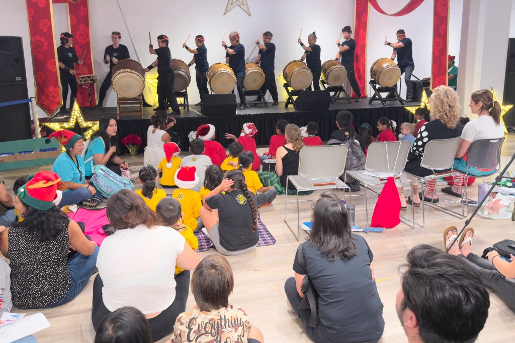 Hearing impaired children from around the state gathered on Thursday December 12th to be entertained and to meet up with a Santa Claus who could speak their language. Although some of the children were reluctant to practice their signing skills, most were able to communicate their Christmas gift Wishes to the man in the red suit. (David Croxford/Civil Beat/2024)