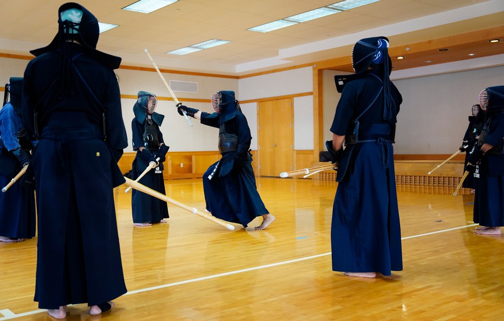 Sensei Garrett Matsumoto demonstrates a move for Kenshikan Kendo Club practice Saturday, Dec. 14, 2024, at the Japanese Cultural Center of Hawai’i in Honolulu. The dojo at JCCH hosts various budo (martial arts) classes every day of the week. (Kevin Fujii/Civil Beat/2024)