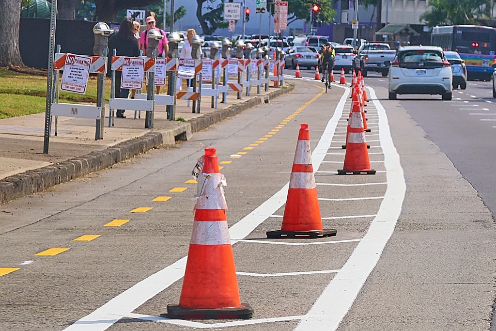 This week the City and County of Honolulu began restriping the road surfaces along King Street between Richards Street and Punchbowl Street to accommodate the new Bike lanes. The work continues along King street and motorists are advised to exercise caution in the area as users become used to the changing traffic patterns. (David Croxford/Civil Beat/2025)