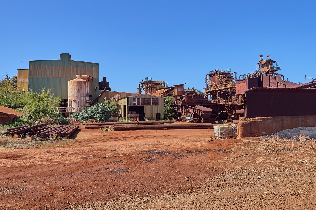 The Gay & Robinson Sugar Mill was shuttered in 2010 after many decades of producing Sugar in the area. All that remains are the rusting symbols of a bygone era. (David Croxford/Civil Beat/2025)