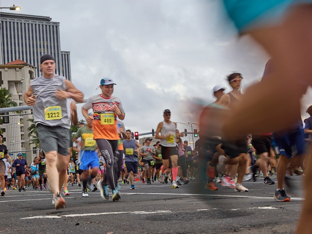 The 41st Great Aloha Run took off with a loud starters gun at 7.00 a.m. on Monday morning. The President's Day event fielded teams from the US Army and Marine Corps along with youth and adults from all walks of life. The 8.15 mile course was set out to accommodate walkers and runners with everyone finishing in Aloha Stadium(David Croxford/Civil Beat/2025)