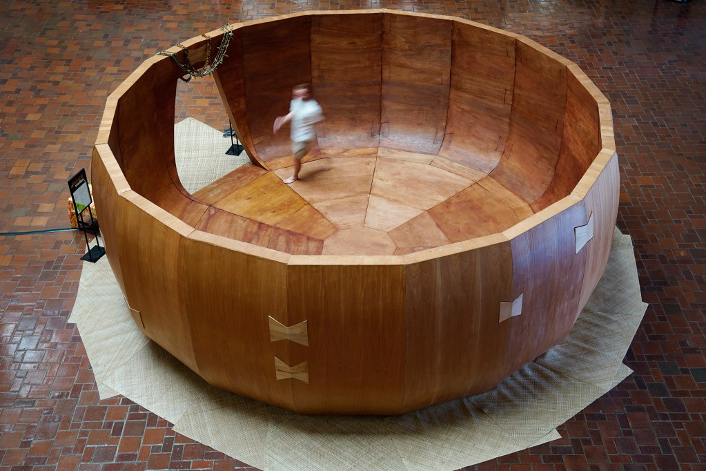 This ‘Umeke Lā’au sits in Honolulu Hale’s foyer Wednesday, March 5, 2025, in Honolulu. This space is noted as cultural medicine to, “offer pule, meditation and conversations involving healing and repair.” according to the sign at its entrance (Kevin Fujii/Civil Beat/2025)