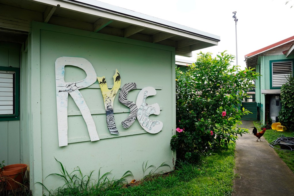 Residential Youth Services and Empowerment, or RYSE, prepares for a morning of outreach Friday, April 25, 2025, in Kailua. (Kevin Fujii/Civil Beat/2025)