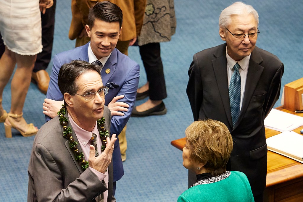 Views from both the House of Representatives and the Senate, photographed April 30th, 2025. Discussion during the recesses and during each of the bills under discussion.Senator Karl Rhoads in discussions during recess.(David Croxford/Civil Beat/2025)