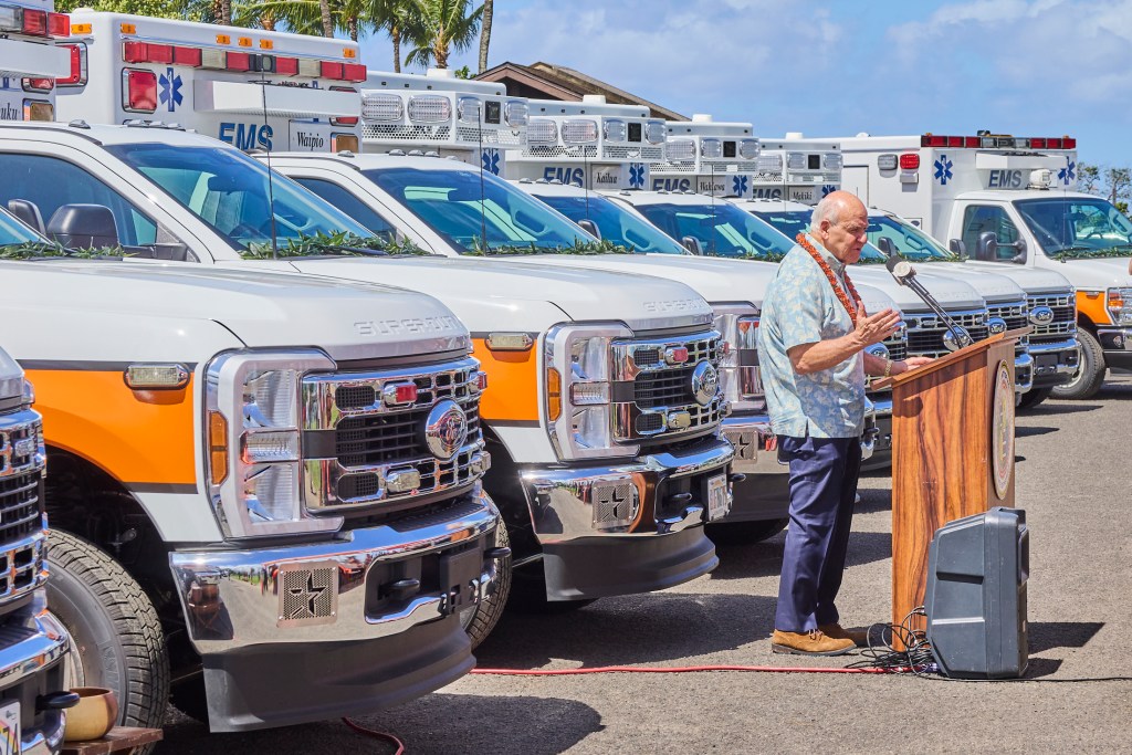 On Tuesday May 7th, Honolulu Mayor Rick Blangiardi, a number of Honolulu Council members and several EMS leaders gathered at Keehi Beach Park to partake in an Hawaiian blessing. The blessing was for a group of 17 new emergency response vehicles that will be positioned across O’ahu within the month of May. The units include 14 EMS Ambulances, 2 C.O.R.E rigs and an AmbuBus that can support mass casualty events and evacuations. Another 4 additional Ambulances will arrive in the Fall, completing the largest one time deployment of emergency vehicles(David Croxford/Civil Beat/2025)