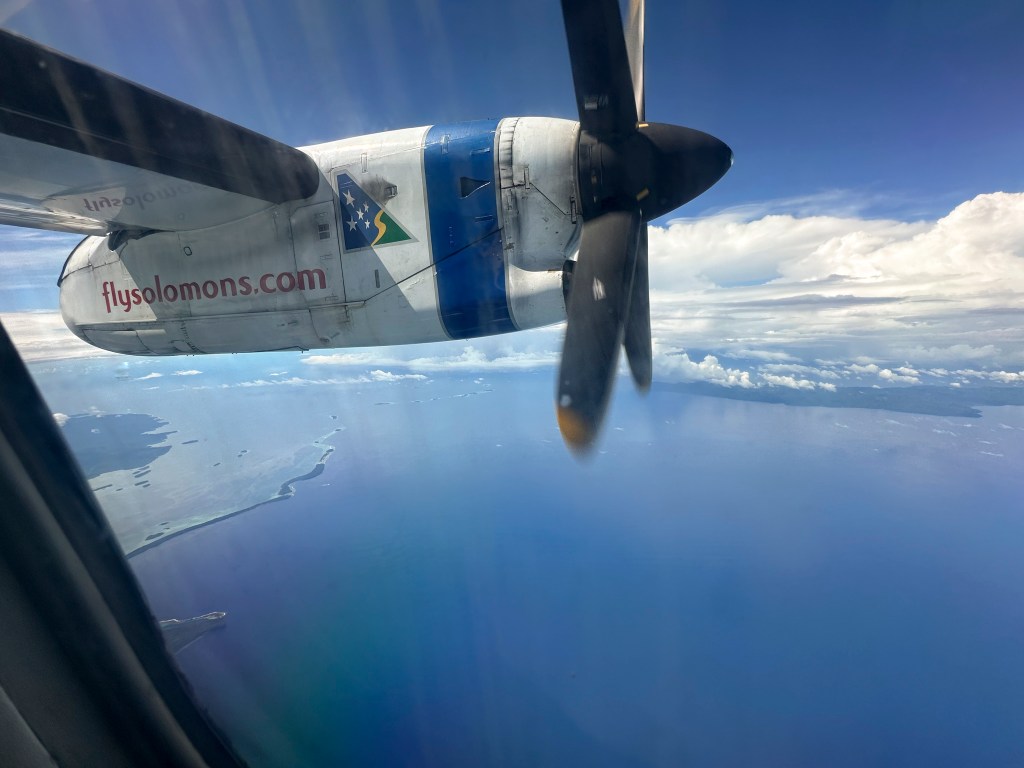 A Solomon Airlines flight over Western Province. (Nathan Eagle/Civil Beat/2025)