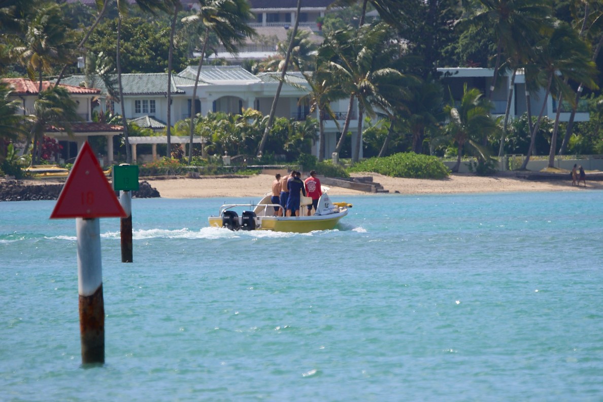 HFD Rescue 1 Boat crew are photographed, preparing, stocking and launching their vessel to take it from Maunaloa Bay over to China Walls on June 6th to continue searching for 21 year old OÕahu resident who is believed missing in the area. Khilye Hamadani last spoke with relatives on Tuesday and her shoes and belongings were discovered in the area of Waialae Beach Park and China Walls.(David Croxford/Civil Beat/2025)