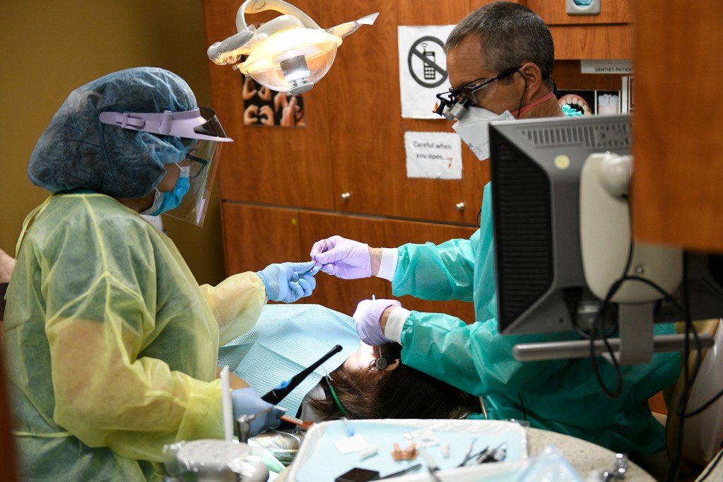 A patient receives dental care at the Kalilhi-Pālama Health Center's downtown clinic, on Tuesday, July 8, 2025. (Special to Honolulu Civil Beat Ronen Zilberman)