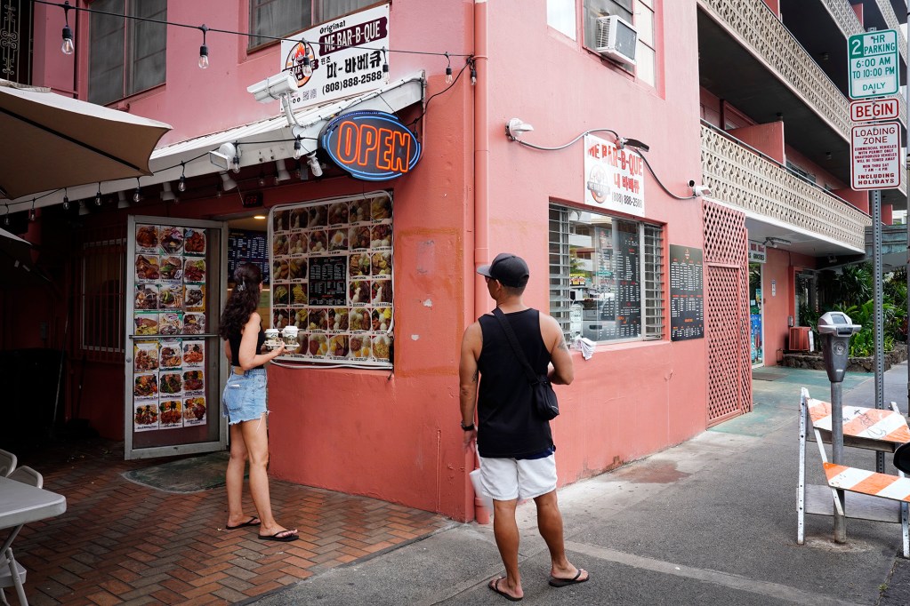 One of two different Waikīkī-area Me B.B.Q eateries are photographed Thursday, June 17, 2025, in Honolulu. This one is located at 2427 Kūhiō Ave. (Kevin Fujii/Civil Beat/2025)