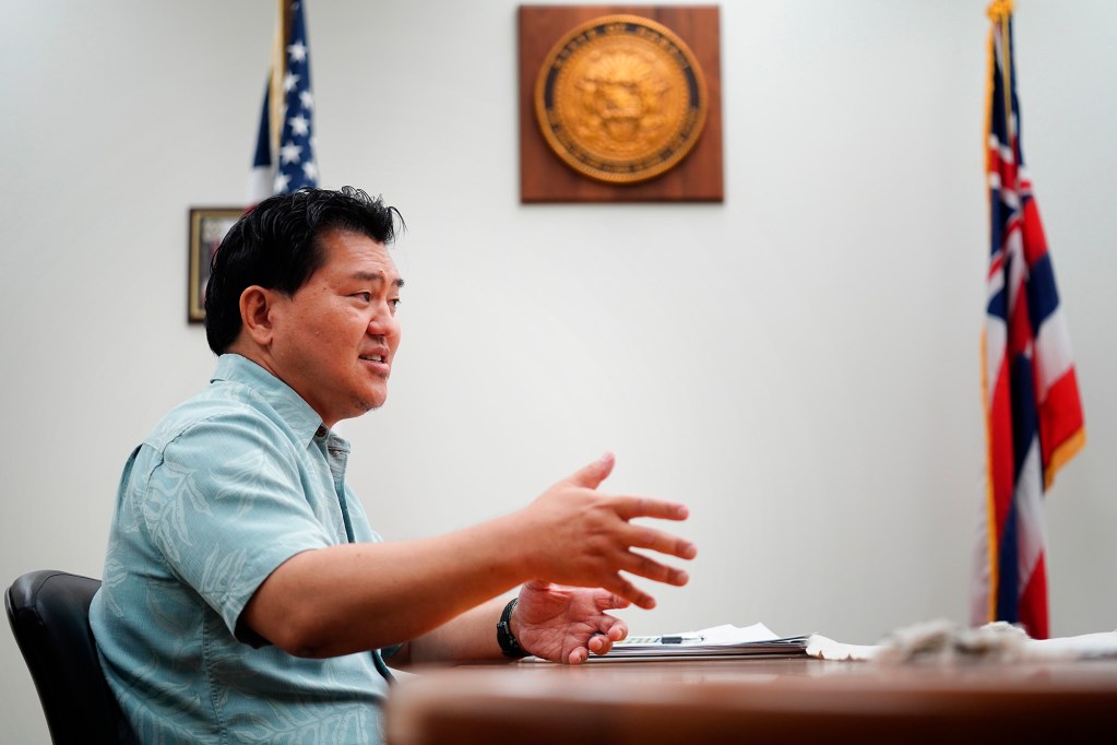 Marcus Kawatachi, the executive director of the Hawaiʻi Civil Rights Commission, is photographed Thursday, Aug. 28, 2025, in Honolulu. (Kevin Fujii/Civil Beat/2025)