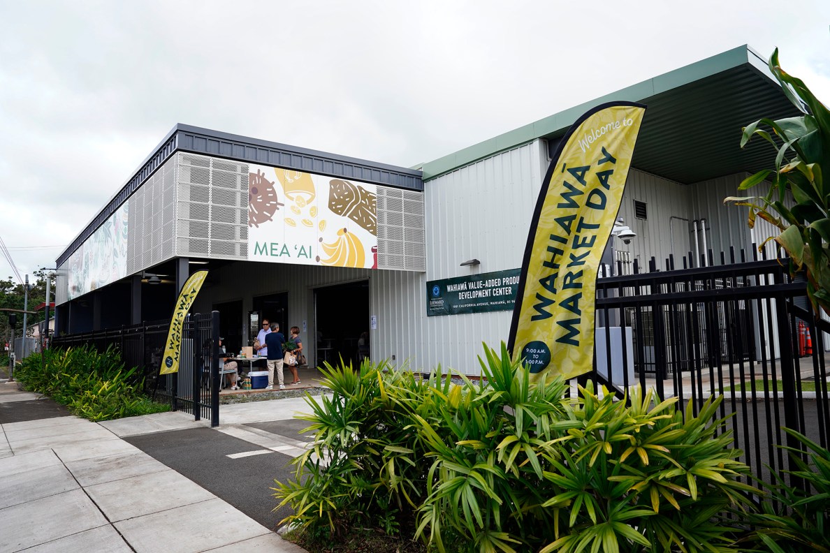 The Wahiawā Value-Added Product Development Center (WVAPDC) opens its doors for the Wahiawā Market Day Saturday, Sept. 20, 2025, in Wahiawā. Wahiawā Market Day is every third Saturday of each month, 9:00 a.m. to 1:00 p.m. at the WVAPDC. It’s located at 1001 California Avenue and introduces patrons to local farmers, food producers and artisan products grown and produced with Hawaiʻi’s local flavors and culture. (Kevin Fujii/Civil Beat/2025)