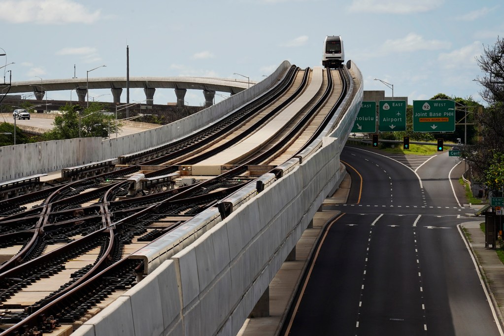 A Honolulu Authority for Rapid Transportation’s Skyline train on the Section 2 route as seen from the Makalapa Pearl Harbor Naval Base station Thursday, Oct. 9, 2025, in Honolulu. (Kevin Fujii/Civil Beat/2025)