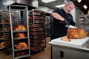 Buckets Of Cranberry Sauce, Stacks Of Turkeys: Hotel Feeds Homeless