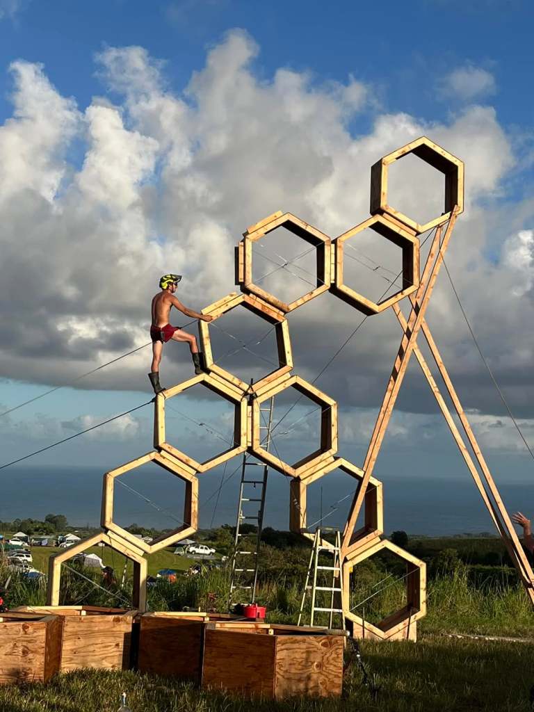 A structure built as part of a Falls of Fire festival held on pasture land in Pāpaʻikou outside of Hilo. The county has imposed $34,000 in fines on the landowner for holding the event without a special permit (Courtesy Facebook Falls on Fire)