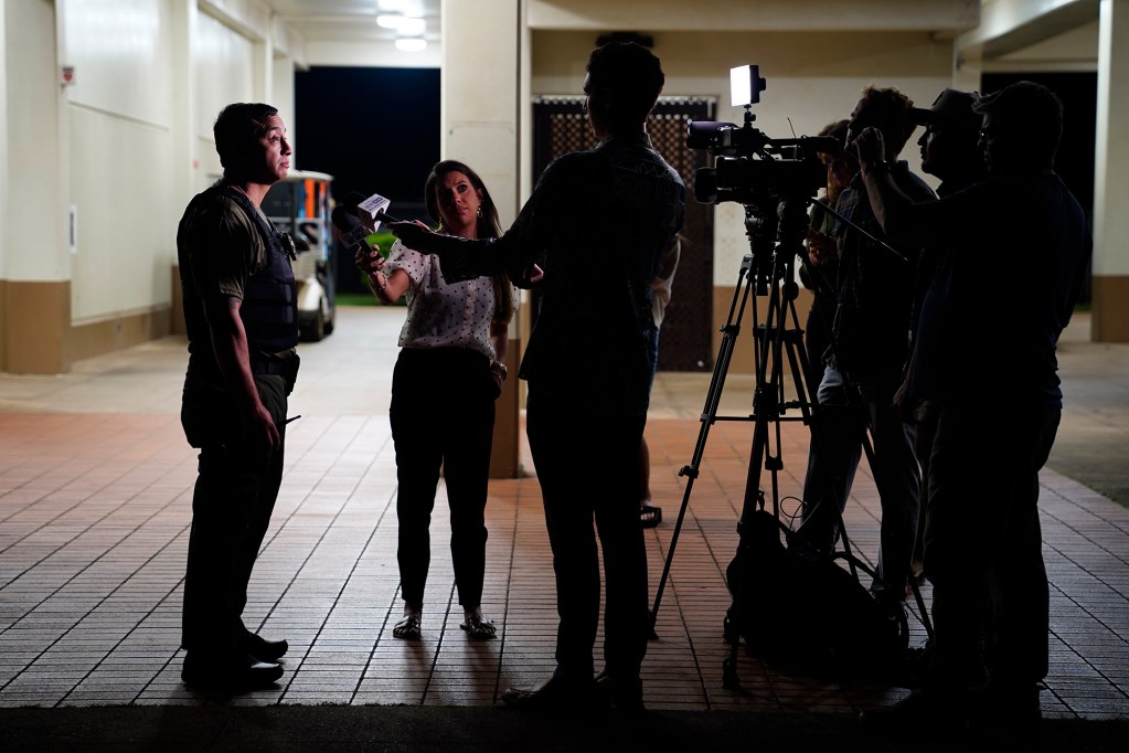 Department of Law Enforcement Director Mike Lambert talks with journalists after a ride along Wednesday, Dec. 31, 2025, in Waipahu. New laws, the use of aerial drones and citizens heeding the dangers of fireworks noticeably  curbed the annual personal pyrotechnics. (Kevin Fujii/Civil Beat/2025)