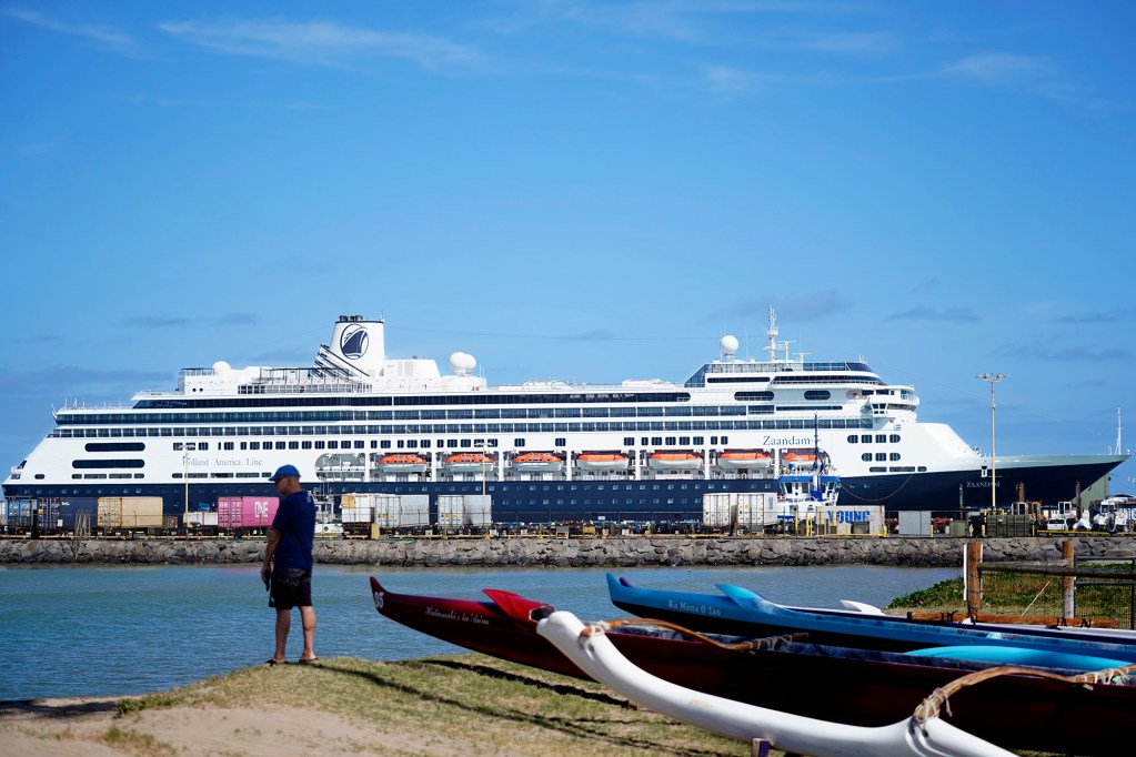 The Holland American Line Zaandam cruise ship docks Tuesday, Jan. 13, 2026, in Kahului Harbor on Maui. The giant cruise ship is juxtaposed with Na Kai Ewalu Canoe Club’s outrigger canoes in the foreground. (Kevin Fujii/Civil Beat/2026)