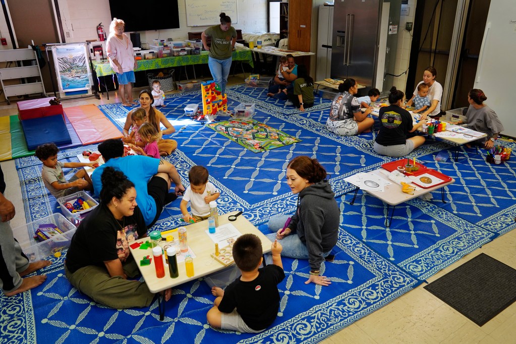 A Keiki O Ka ʻĀina class is photographed Tuesday, Jan. 27, 2026, in Hauʻula. Federal funding cuts for Native Hawaiian education programs will significantly impact family-child interaction learning programs (FCILs) serving kids ages 0 to 5. The programs primarily target rural and Native Hawaiian communities who have limited early education/childcare options. The expected federal cuts will reduce the number of FCIL programs from 60 to 3. (Kevin Fujii/Civil Beat/2026)