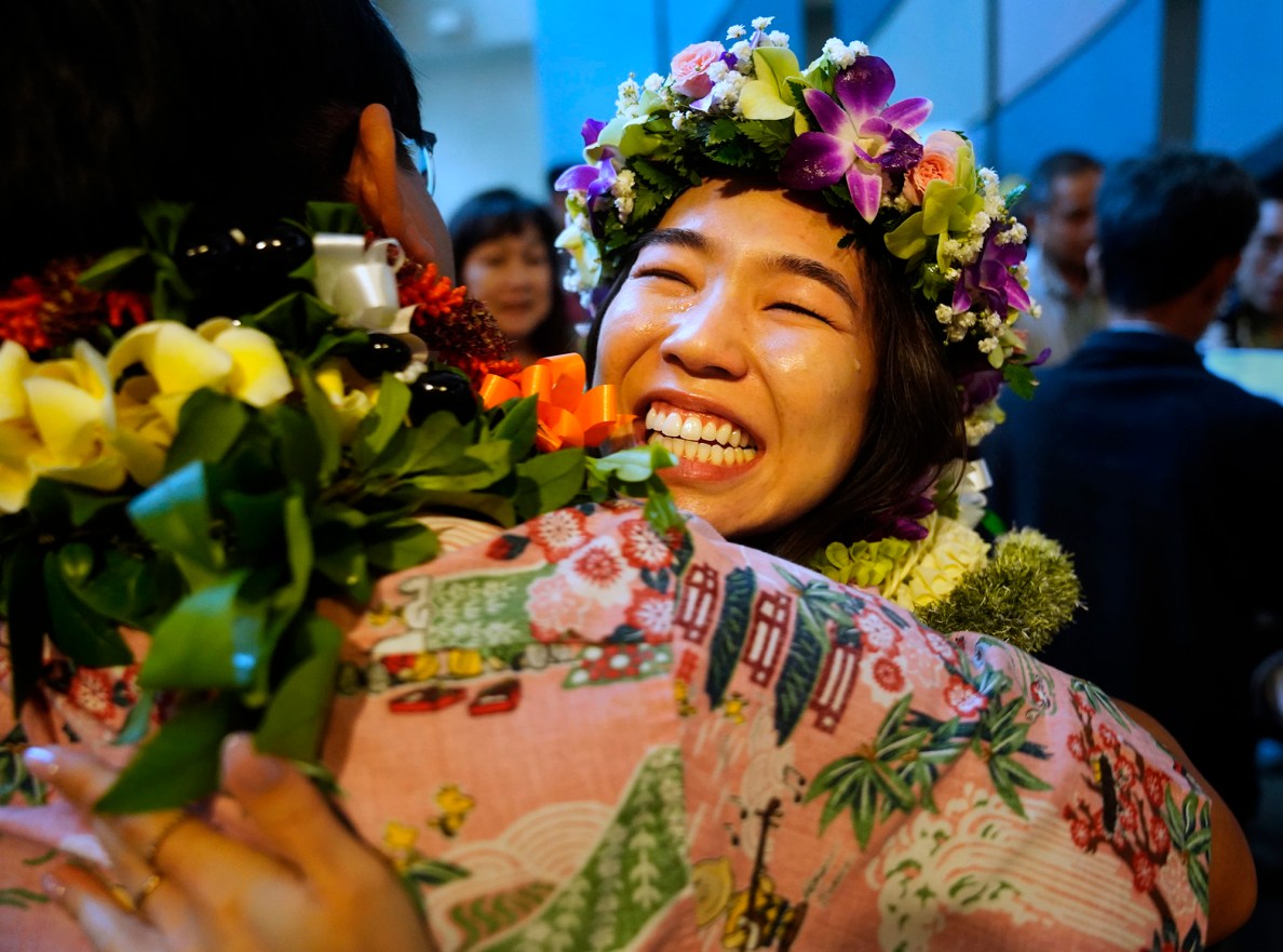 John A. Burns School of Medicine fourth-year students Jamie Emoto hugs Chad Taniguchi after opening their letters on “Match Day” Friday, March 20, 2026, in Honolulu. Emoto, of Lihue, will continue training in pediatrics at UC Irvine Medical Center. Taniguchi is going into emergency medicine at Lehigh Valley Hospital in Pennsylvania. (Kevin Fujii/Civil Beat/2026)