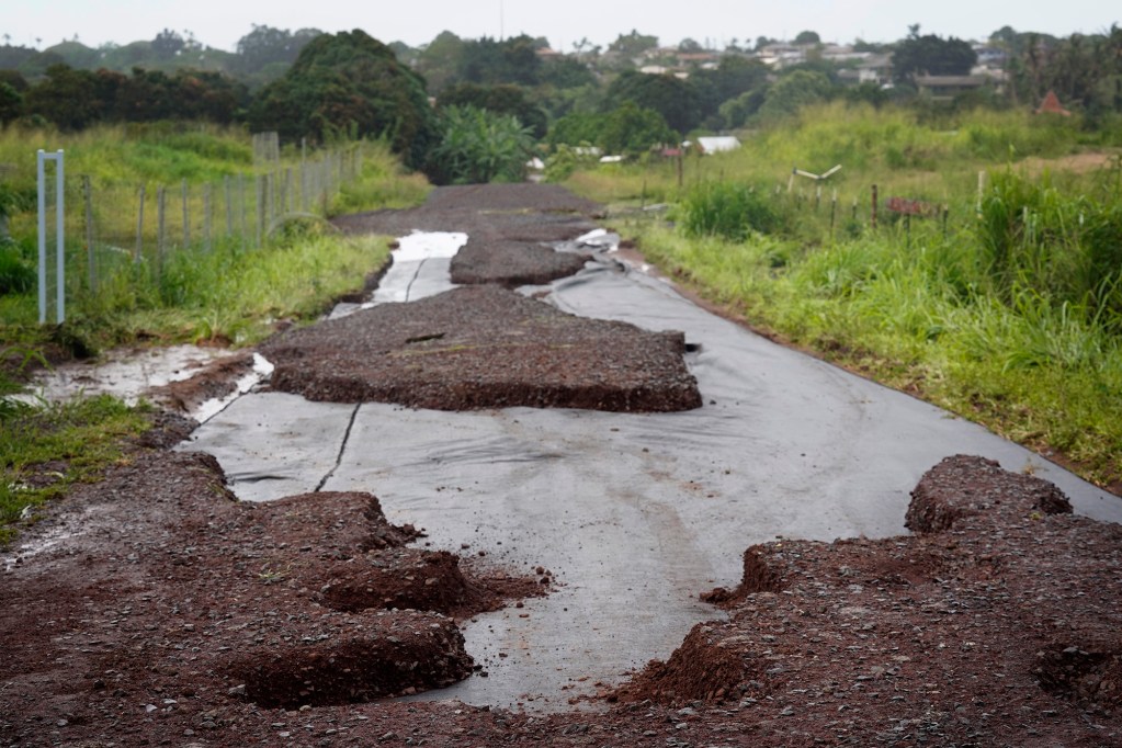 Sections of a private road near Haleʻiwa and Waialua Beach Roads washed away, photographed Saturday, March 21, 2026, in Haleʻiwa. A second Kona low storm brought heavy rain after the previous week’s downpour and high winds. (Kevin Fujii/Civil Beat/2026)