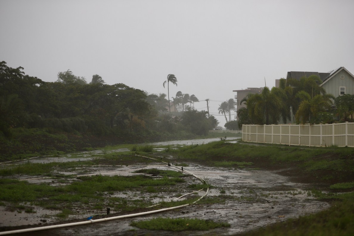 Tre' Evans-Dumaran, a 24-year-old firefighter with the Maui Fire Department, was responding to the flooding between South Kīhei Road and Oluea Street when he was swept up by a powerful current and sucked into an uncovered storm drain in Kulanihakoi gulch. (Erin Nolan/Civil Beat/2026)