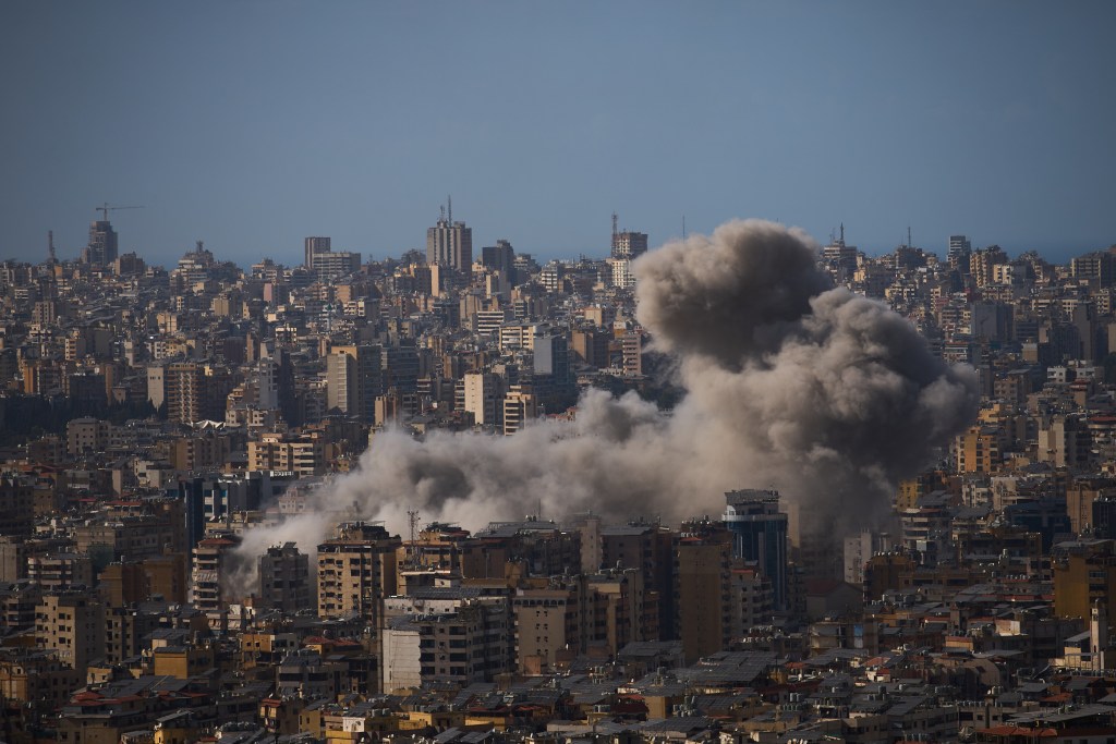 Smoke rises from Israeli airstrikes in Dahiyeh, a southern suburb of Beirut, Lebanon, Sunday, April 5, 2026. (AP Photo/Emilio Morenatti)