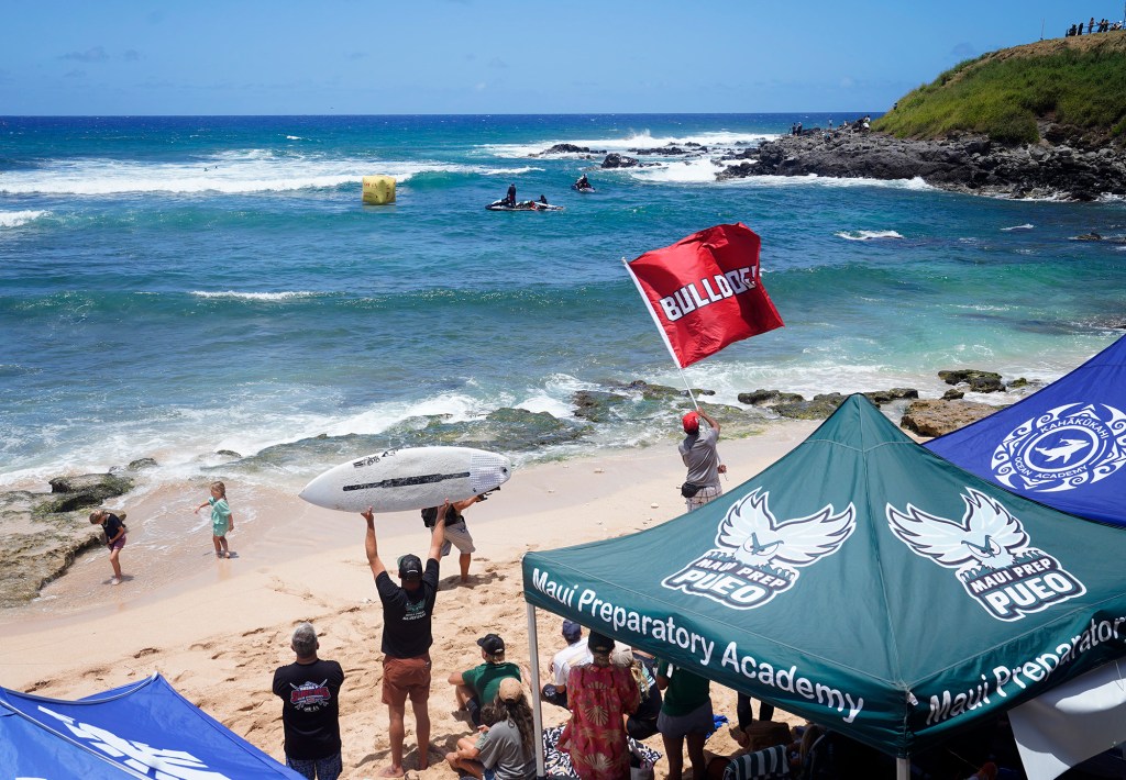Teams set up at Hoʻokipa Beach Park for the inaugural Hawaiʻi High School Athletics Association surfing championships Saturday, May 2, 2026, in Pāʻia. (Kevin Fujii/Civil Beat/2026)