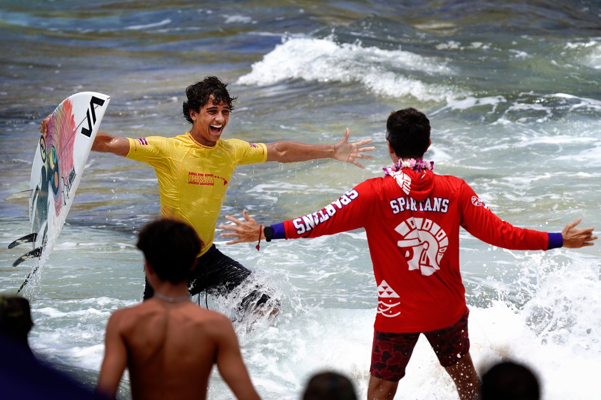 Kahlil Pineres-Schooley of Seabury Hall celebrates winning the inaugural Hawaiʻi High School Athletics Association surfing state championships boys shortboard Saturday, May 2, 2026, at Hoʻokipa Beach Park in Pāʻia. (Kevin Fujii/Civil Beat/2026)