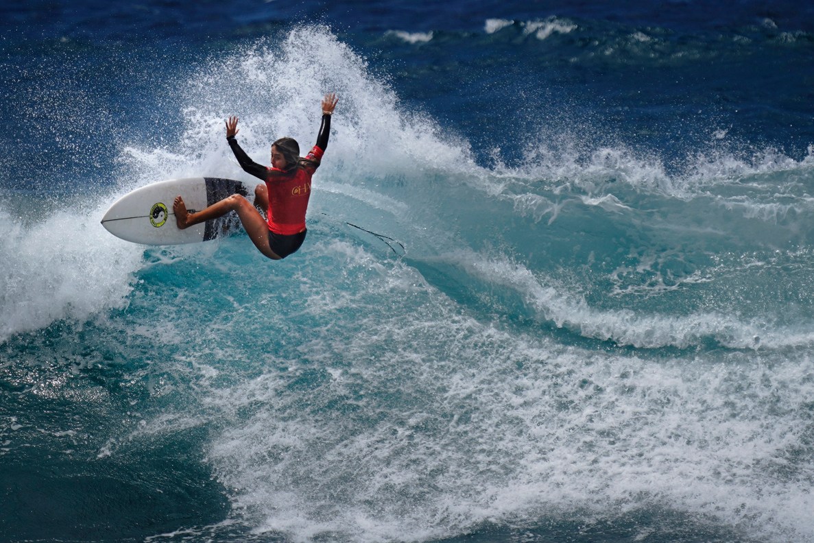 Skai Suitt of Waialua High School competes in the inaugural Hawaiʻi High School Athletics Association surfing state championships in girls shortboard Saturday, May 2, 2026, at Hoʻokipa Beach Park in Pāʻia. Suitt was later crowned the girls shortboard champion. (Kevin Fujii/Civil Beat/2026)