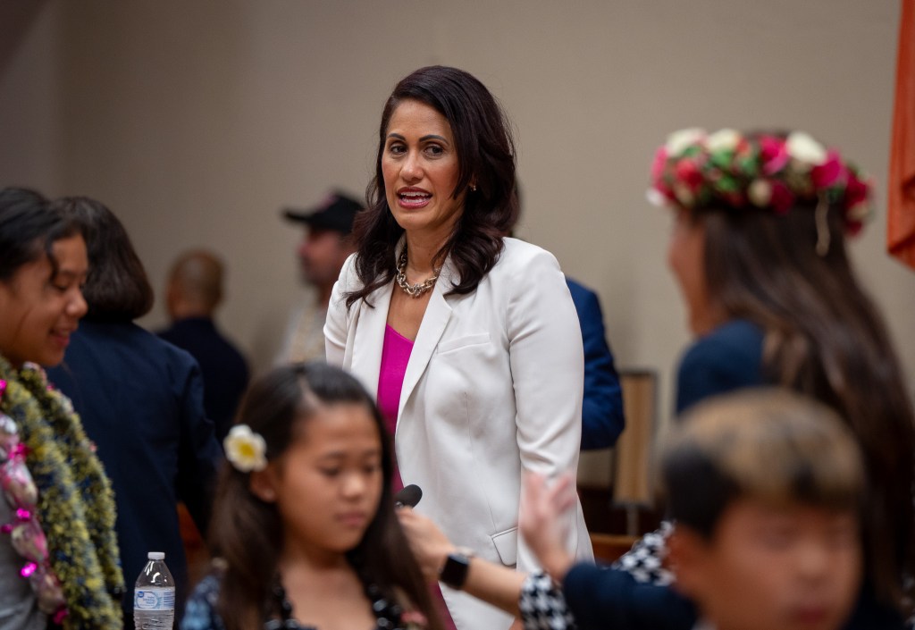 Vice Chair Andria Tupola with honorees of council recognition at City Council chambers in Honolulu May 13, 2026. (Craig Fujii/Civil Beat/2026)