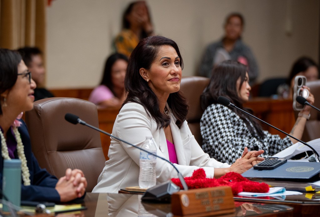 Vice Chair Andria Tupola, center, at City Council chambers in Honolulu May 13, 2026. Floor leader Esther Kia'āina is at left, and councilmember Radiant Cordero is at right. (Craig Fujii/Civil Beat/2026)
