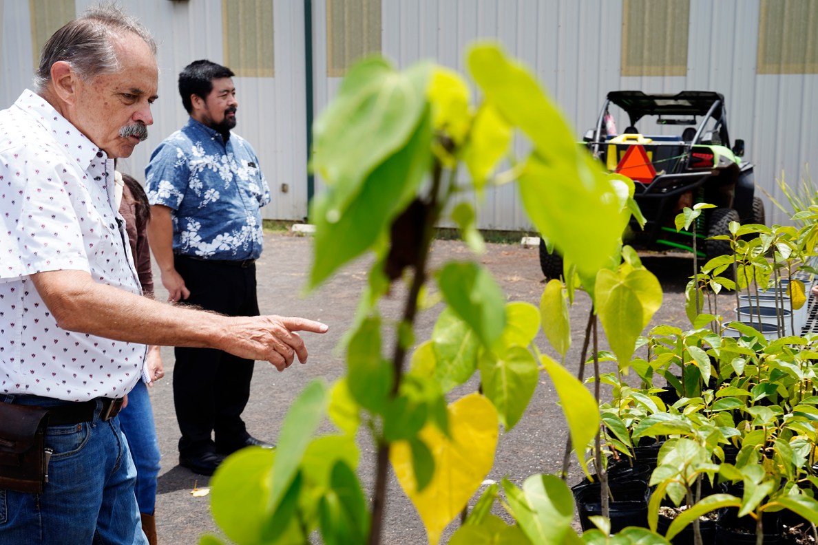 Kekaha Agriculture Association’s executive director Mike Faye, from left, and president Josh Uyehara stand outside of their processing facility Tuesday, May 12, 2026, in Kekaha. (Kevin Fujii/Civil Beat/2026)
