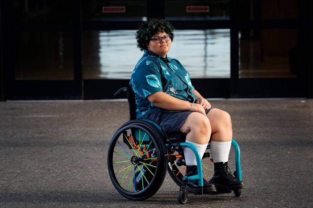 Moss Kuon is photographed Sunday, June 28, 2026, at Daniel K. Inouye International Airport in Honolulu. Kuon’s wheelchair has been damaged by Hawaiian Airlines. (Kevin Fujii/Civil Beat/2026)