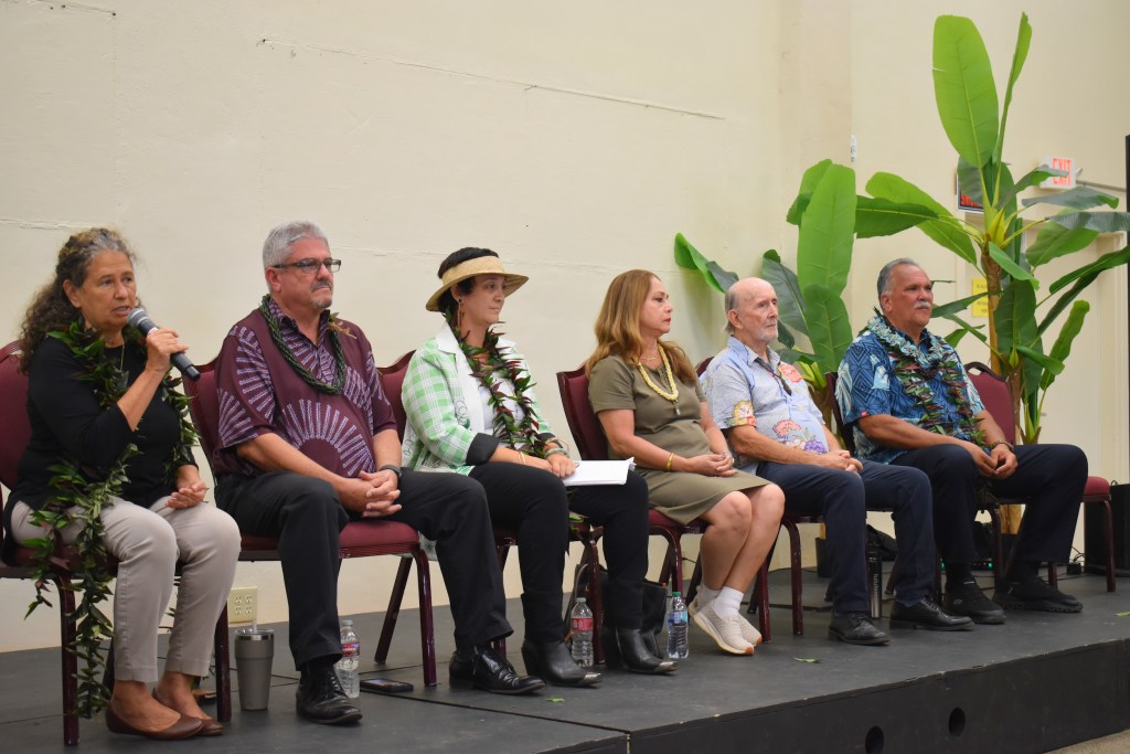 Kaua‘i mayoral candidates (from left) Felicia Cowden, Mel Rapozo, Michaela Widener, Laura Lindsey, Megeso-William Denis and Bernard Carvalho at a forum organized by Mālama Kaua‘i for its 20th anniversary party in Līhu‘e on June 13. (Noelle Fujii-Oride/Civil Beat/2026)