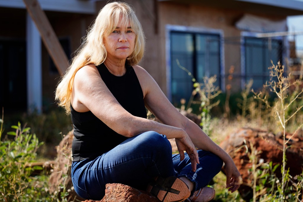 Krista Woodward is photographed at her stalled home reconstruction Wednesday, July 1, 2026, in Lahaina. Woodward’s contractor allegedly scammed her and others rebuilding in Lahaina. (Kevin Fujii/Civil Beat/2026)