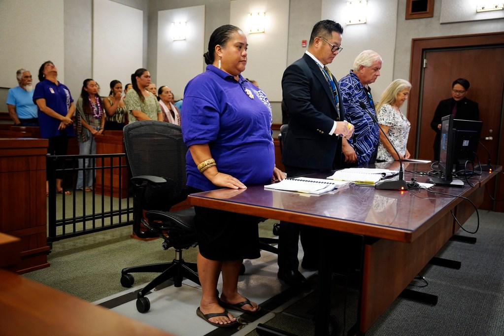 Kula Aupuni Niihau A Kahelelani Aloha’s Kaleolani Stevens, from left, Attorney General office lawyer Carter Siu and defendant Steven Sullivan appear in court Wednesday, July 22, 2026, in Līhuʻe. One of the few schools dedicated to teaching the Niʻihau dialect of the Hawaiian language is at risk of losing its campus with the school year just a few weeks away. (Kevin Fujii/Civil Beat/2026)