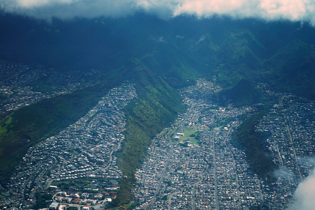Honolulu neighborhoods find themselves in places dictated by the ʻāina Thursday, July 30, 2026, as seen flying over Honolulu, (Kevin Fujii/Civil Beat/2026)