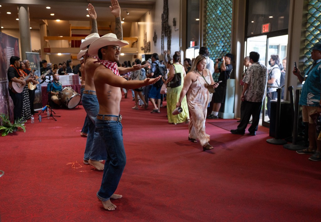 Dancers and musicians greet attendees to the 2026 Native Hawaiʻian Convention at Blaisdell Center July 21, 2026. (Craig Fujii/Civil Beat/2026)