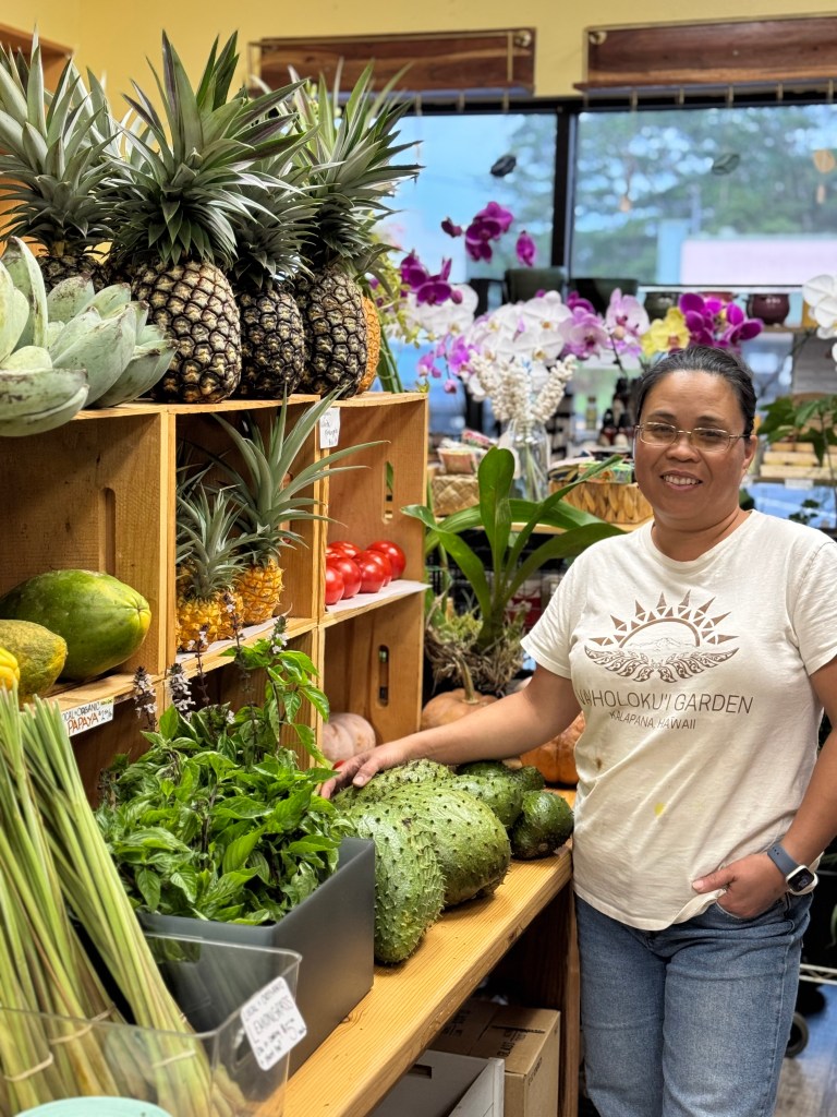 Elizabeth Ward, the owner of Waiholokui Garden, in her store.