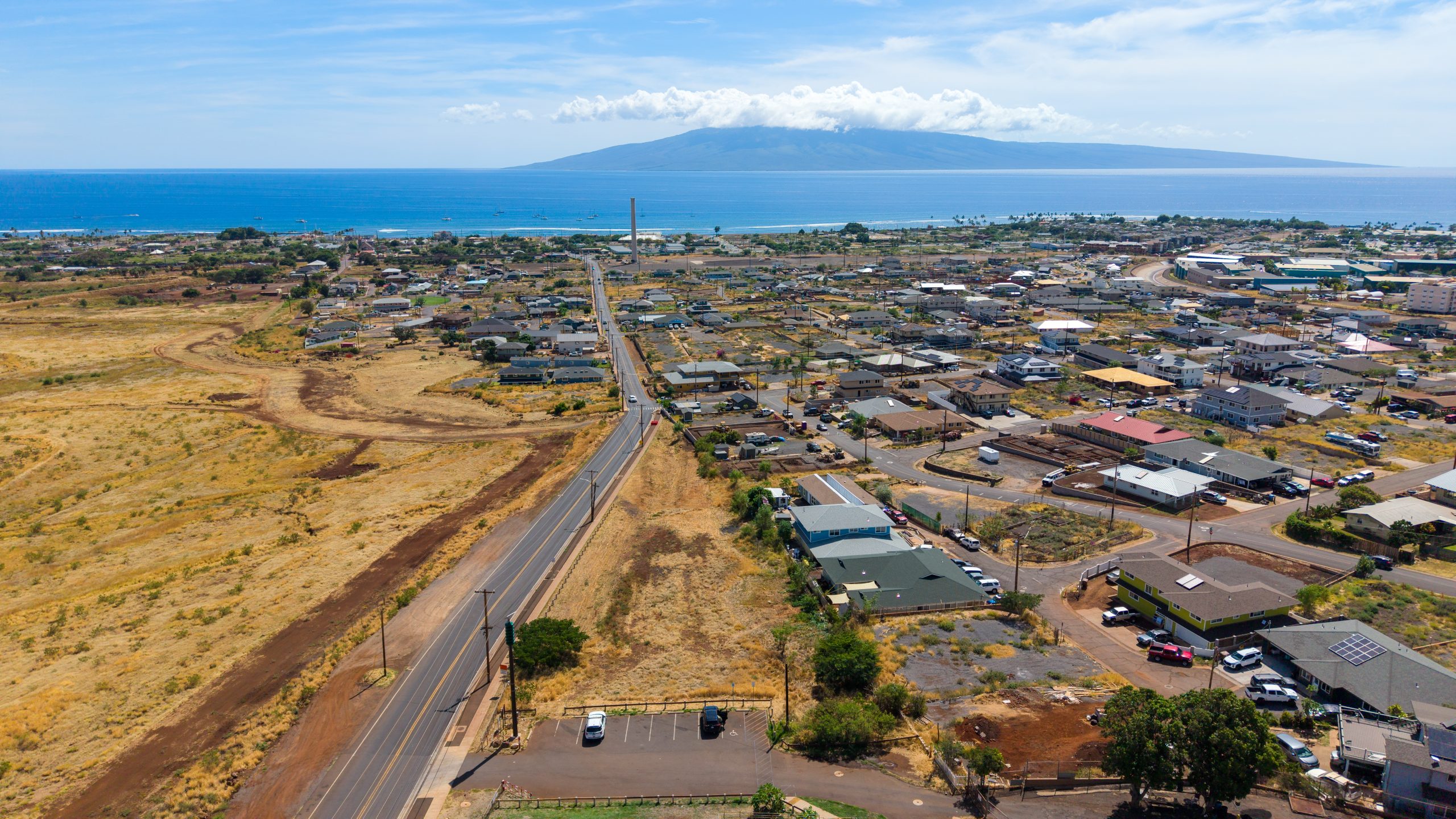 Three years after the fire, the area along Lahainaluna Road is sprinkled with construction sites. (Sean Hower/Civil Beat/2026)