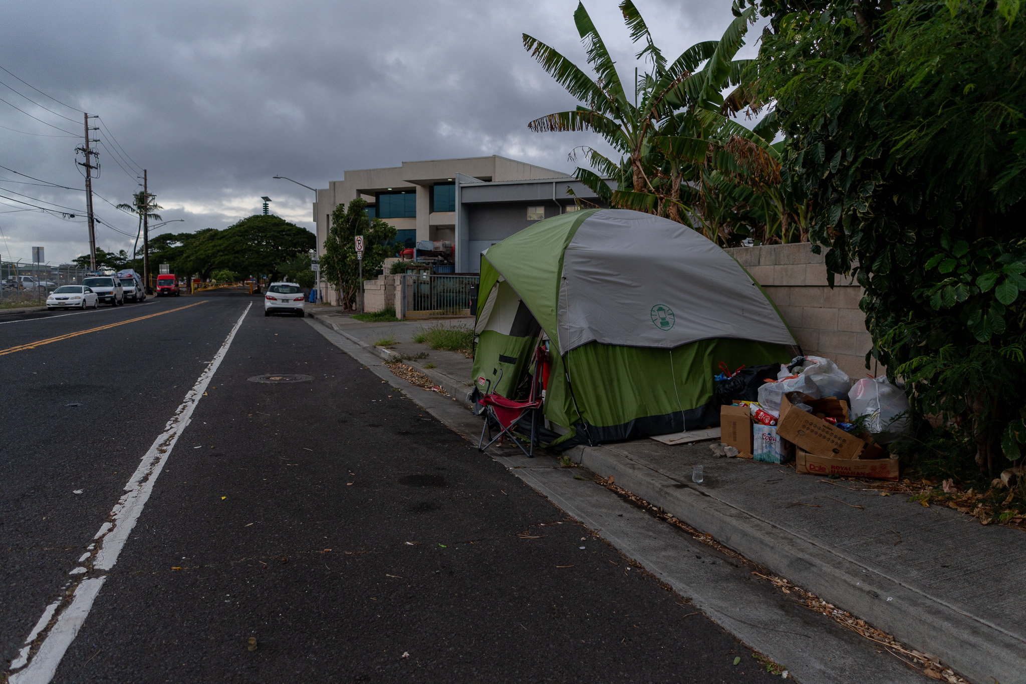 A tent on Sand Island Parkway August 14, 2026. Ronnie Jaralba was found deceased nearby. (Craig Fujii/Civil Beat/2026)