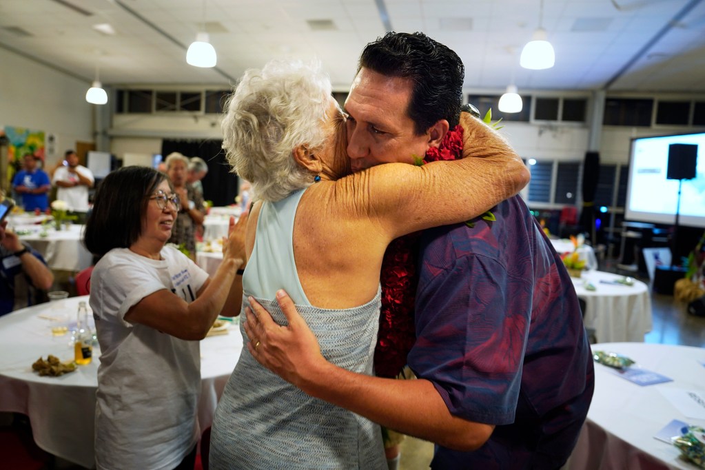 Supporter Lani Twomey hugs Sen. Jarrett Keohokalole after the first primary election results are announced Saturday, Aug. 8, 2026, in Honolulu. (Kevin Fujii/Civil Beat/2026)