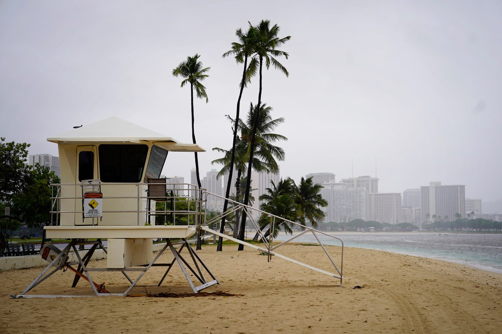 Ala Moana Regional Park’s beach lies empty after Tropical Storm Lala’s wind and rain caused disruptions Sunday, Aug. 16, 2026, in Honolulu. The storm reaches O‘ahu after being downgraded from a hurricane. It passed closely to Hawai‘i Island. (Kevin Fujii/Civil Beat/2026)