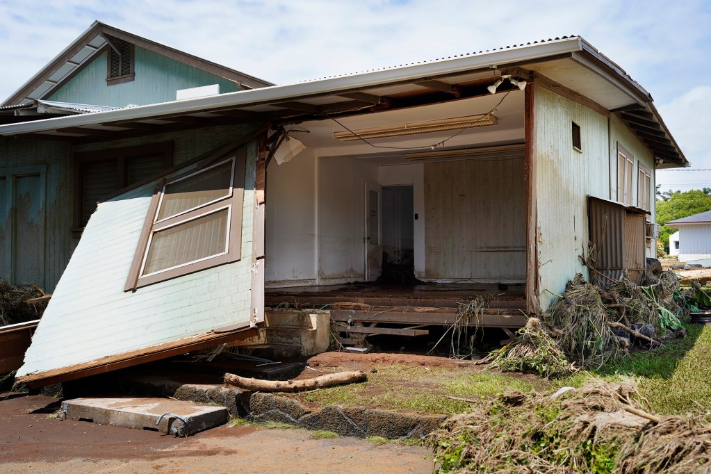 A wall remains partially attached to the Nāʻālehu Ace Hardware Tuesday, Aug. 18, 2026, on Hawaiʻi Island. Hurricane Lala made a close pass to the South Point of the Big Island Saturday. (Kevin Fujii/Civil Beat/2026)