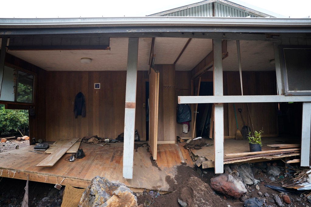 The Kawakami house has endured four flooding events photographed Tuesday, Aug. 18, 2026, in Nāʻālehu. He was sleeping when water and debris from Hurricane Lala swept through the town of Nāʻālehu on Hawaiʻi Island. (Kevin Fujii/Civil Beat/2026)