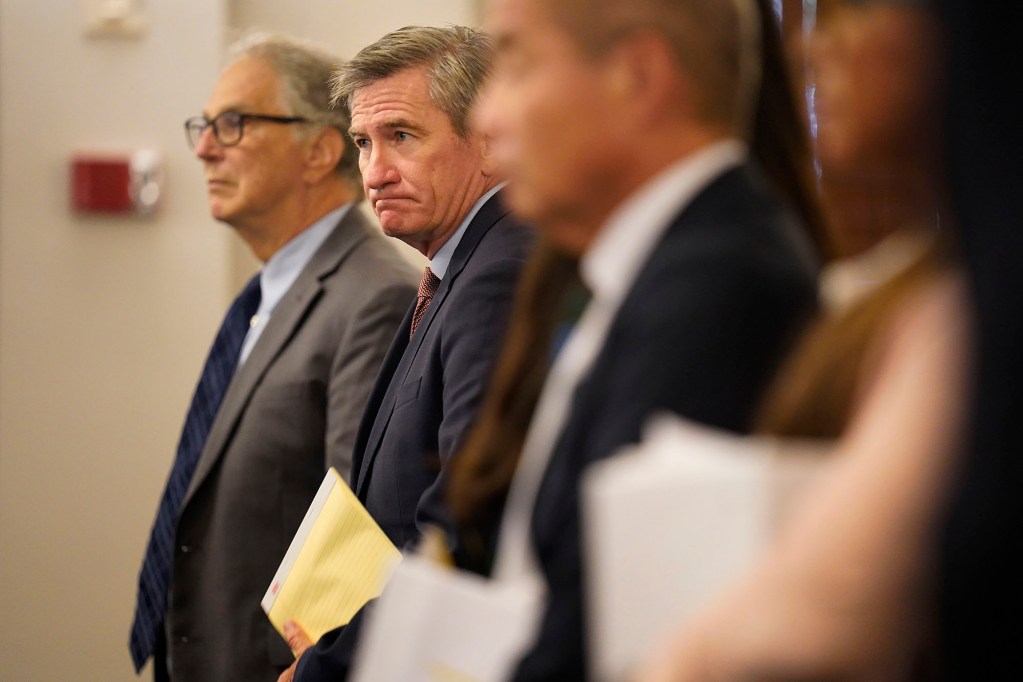 Tommy Waters stands as the Hawaiʻi State Supreme Court judges enter to hear oral arguments on his primary election ineligibility appeal on Tuesday, Aug. 25, 2026, in Honolulu. 40 residents have also filed a lawsuit for Waters to be on the ballot in the upcoming general election. (Kevin Fujii/Civil Beat/2026)