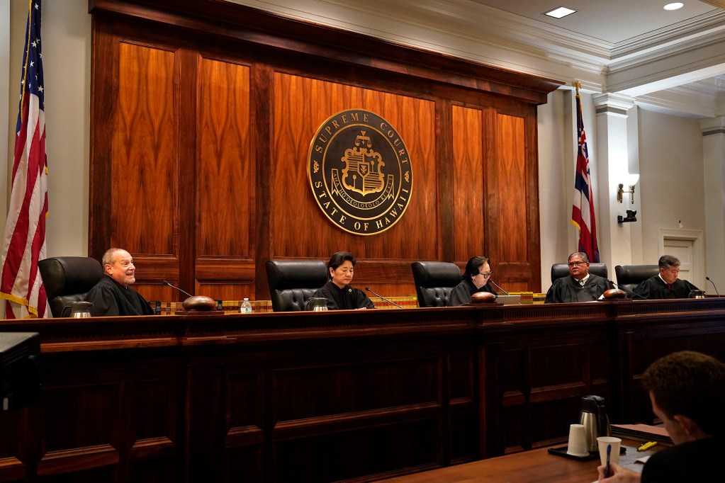 Substitute Justice Peter Cahill, from left, Associate Justice Lisa Ginoza, Acting Chief Justice Sabrina McKenna, Substitute Justice Micheal Soong and Substitute Justice Peter Kubota are photographed during oral arguments for Tommy Waters’s city council election ineligibility appeal Tuesday, Aug. 25, 2026, at the Hawaiʻi State Supreme Court in Honolulu. (Kevin Fujii/Civil Beat/2026)