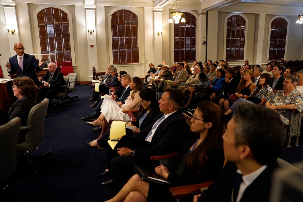 Attorney Tommy Otake, left, turns toward the full gallery during his oral arguments for his Tommy Water’s election ineligibility appeal Tuesday, Aug. 25, 2026, at the Hawaiʻi State Supreme Court in Honolulu. Otake represents the 40 residents who filed a lawsuit for Waters to be on the ballot in the upcoming general election. (Kevin Fujii/Civil Beat/2026)