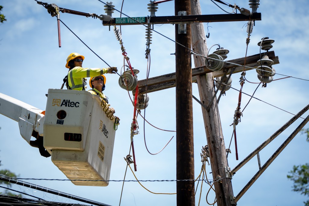 HECO workers on Higgins Road in Mililani August 18, 2026. Storm Lala brought down transmission lines across the state.